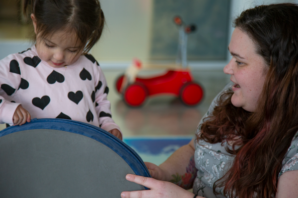 educator playing with child